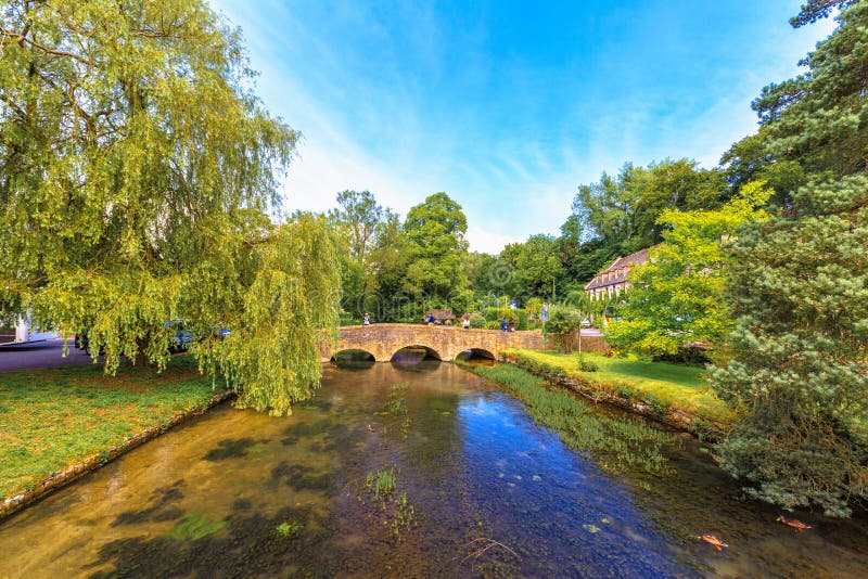 Bridge cross the canal in Bibury Village, Cotswolds, Gloucestershire, England, United Kingdom. Bridge cross the canal in Bibury Village, Cotswolds, Gloucestershire, England, United Kingdom