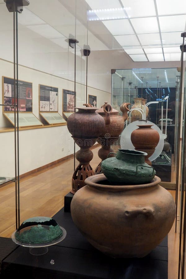 Grave goods originating from the Faliscan territory in the National Etruscan Museum of Villa Giulia in Rome, Italy. The goods dates from the seventh century B.C. They document the influence of the Etruscan on the populations like the Faliscan due to the geographic proximity in the northern Lazio, on the Etruscan side of the Tiber River and are intimately correlated to the creation of the museum of Villa Giulia. Created in 1899, the Etruscan Museum of Villa Giulia houses works from pre-Roman Italian antiquity, especially from the Etruscan world. Among the museum’s most valuable objects are a sarcophagus from the year 520 BC, as well as several terracotta figures such as the Apollo of Veii and the image of Hercules and Apollo vying for the deer, both from 510 BC. The museum also presents a great collection of precious objects from antiquity to the 19th century. Grave goods originating from the Faliscan territory in the National Etruscan Museum of Villa Giulia in Rome, Italy. The goods dates from the seventh century B.C. They document the influence of the Etruscan on the populations like the Faliscan due to the geographic proximity in the northern Lazio, on the Etruscan side of the Tiber River and are intimately correlated to the creation of the museum of Villa Giulia. Created in 1899, the Etruscan Museum of Villa Giulia houses works from pre-Roman Italian antiquity, especially from the Etruscan world. Among the museum’s most valuable objects are a sarcophagus from the year 520 BC, as well as several terracotta figures such as the Apollo of Veii and the image of Hercules and Apollo vying for the deer, both from 510 BC. The museum also presents a great collection of precious objects from antiquity to the 19th century.