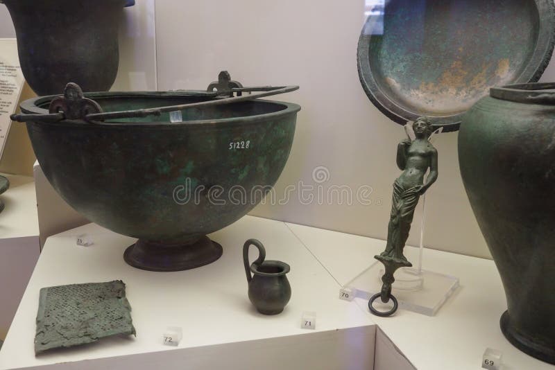 Bronze objects originating from the Castellani collection in the first floor of the National Etruscan Museum of Villa Giulia  in Rome, Italy. The collection of the important family of Roman goldsmiths dates from the 19th century and spaces from Etruscan ceramic, bronze, jewelry. Created in 1899, the Etruscan Museum of Villa Giulia houses works from pre-Roman Italian antiquity, especially from the Etruscan world. Among the museum’s most valuable objects are a sarcophagus from the year 520 BC, as well as several terracotta figures such as the Apollo of Veii and the image of Hercules and Apollo vying for the deer, both from 510 BC. The museum also presents a great collection of precious objects from antiquity to the 19th century. Bronze objects originating from the Castellani collection in the first floor of the National Etruscan Museum of Villa Giulia  in Rome, Italy. The collection of the important family of Roman goldsmiths dates from the 19th century and spaces from Etruscan ceramic, bronze, jewelry. Created in 1899, the Etruscan Museum of Villa Giulia houses works from pre-Roman Italian antiquity, especially from the Etruscan world. Among the museum’s most valuable objects are a sarcophagus from the year 520 BC, as well as several terracotta figures such as the Apollo of Veii and the image of Hercules and Apollo vying for the deer, both from 510 BC. The museum also presents a great collection of precious objects from antiquity to the 19th century.