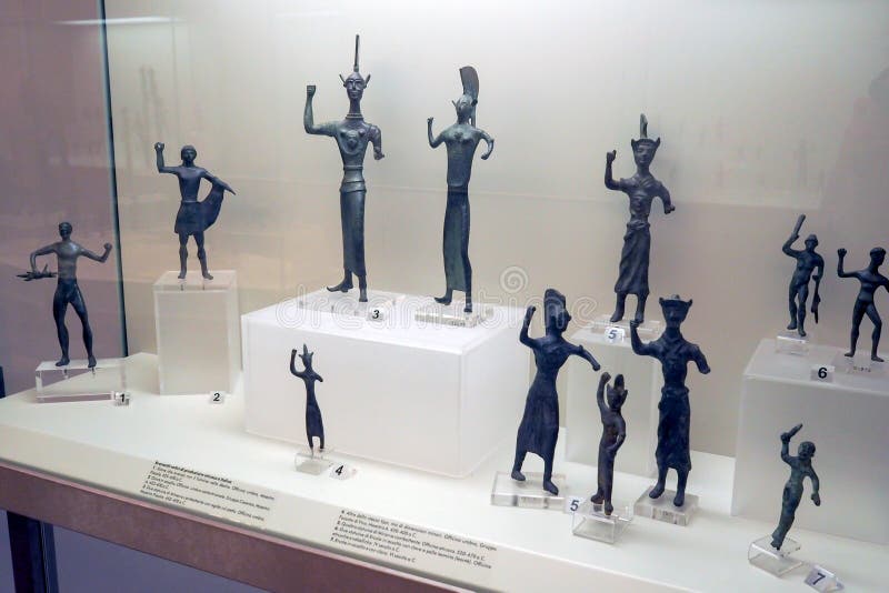 Small bronze sculptures from the Umbrian area in the first floor of Villa Giulia today the National Etruscan Museum in Rome, Italy. The statues represents warriors and goodnesses and originate from the collections of the former Kicheriano Museum. Founded in the baroque time the museum Kicheriano aimed to document the daily life of the antiquity among daily life objects. Created in 1899, the Etruscan Museum of Villa Giulia houses works from pre-Roman Italian antiquity, especially from the Etruscan world. Among the museum’s most valuable objects are a sarcophagus from the year 520 BC, as well as several terracotta figures such as the Apollo of Veii and the image of Hercules and Apollo vying for the deer, both from 510 BC. The museum also presents a great collection of precious objects from antiquity to the 19th century. Small bronze sculptures from the Umbrian area in the first floor of Villa Giulia today the National Etruscan Museum in Rome, Italy. The statues represents warriors and goodnesses and originate from the collections of the former Kicheriano Museum. Founded in the baroque time the museum Kicheriano aimed to document the daily life of the antiquity among daily life objects. Created in 1899, the Etruscan Museum of Villa Giulia houses works from pre-Roman Italian antiquity, especially from the Etruscan world. Among the museum’s most valuable objects are a sarcophagus from the year 520 BC, as well as several terracotta figures such as the Apollo of Veii and the image of Hercules and Apollo vying for the deer, both from 510 BC. The museum also presents a great collection of precious objects from antiquity to the 19th century.