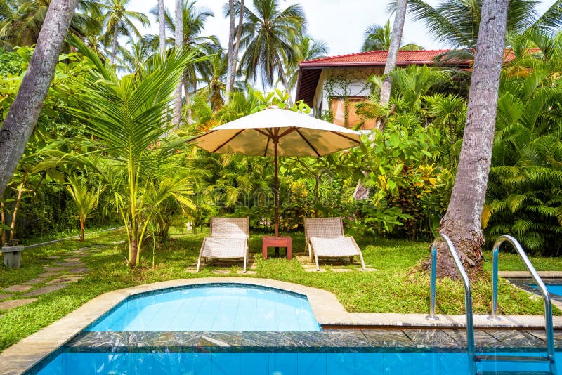 Villa with pool in tropical hotel