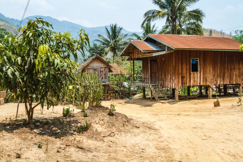Village on the bank of Mekong River in Northern Laos. stock photo Village on the bank of Mekong River in Northern Laos. stock photo