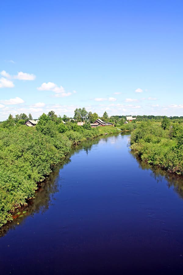 Village on coast river