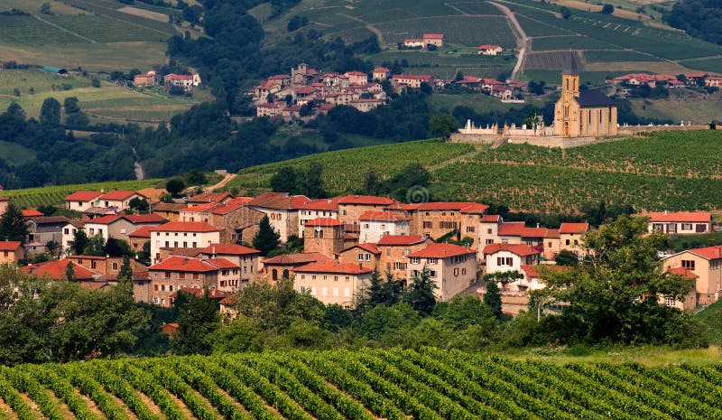 Village in the famous winemaking region of Beaujolais in France. Village in the famous winemaking region of Beaujolais in France.