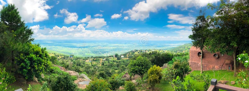 Nursery of baby grape,Agriculture grapevine,row field plantingvillage on the hill with tree,grass and sky in thailand,art rural la. Village on the hill with tree royalty free stock photos Nursery of baby grape,Agriculture grapevine,row field plantingvillage on the hill with tree,grass and sky in thailand,art rural la. Village on the hill with tree royalty free stock photos
