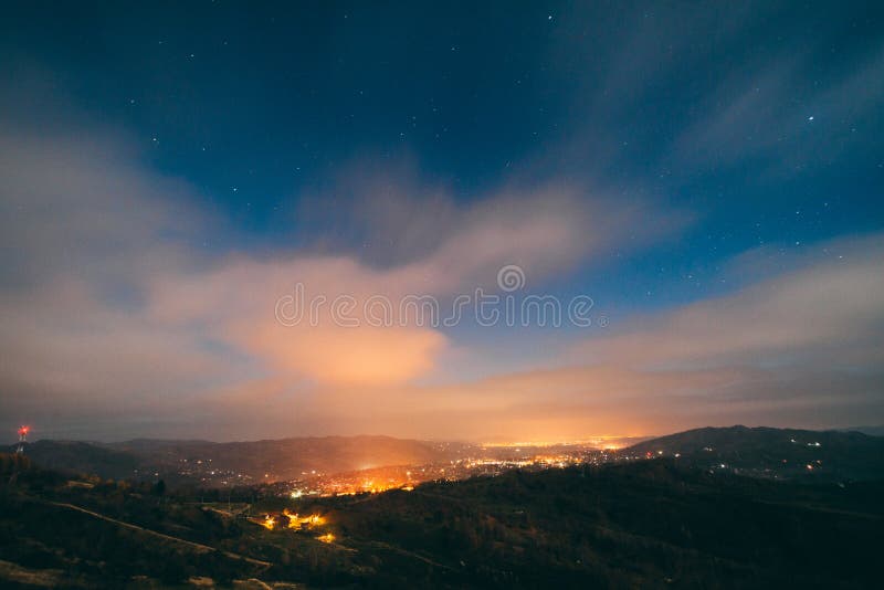 Village lights at night stock image. Image of town, starry 62819697