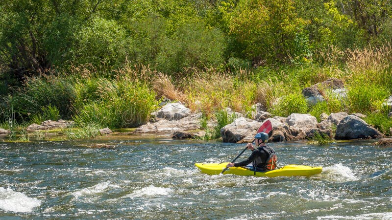 Kayaking on the Southern Bug River in sunny weather. A popular place for extreme recreation. Rafting.