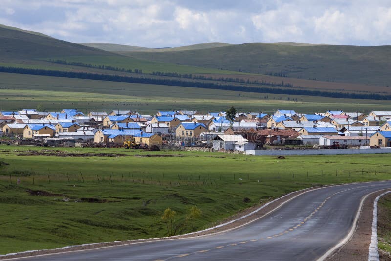 Village beside road