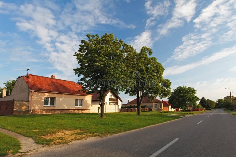 Village road with houses in Slovakia