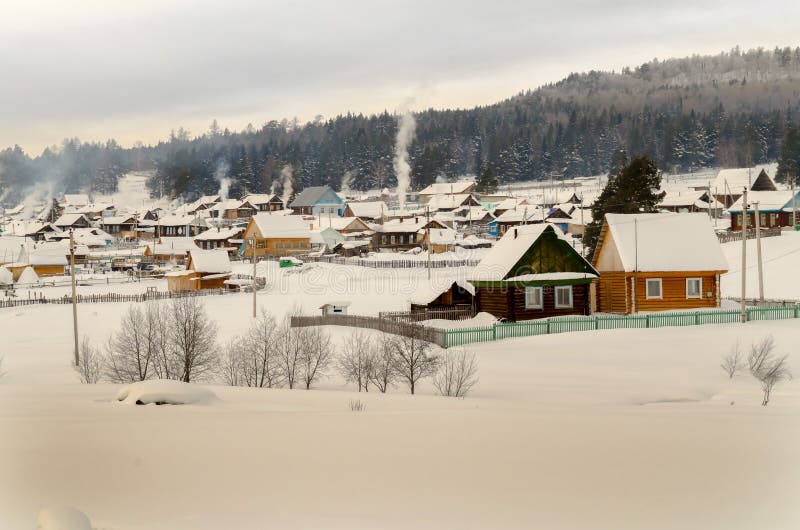 Village in winter in mountains