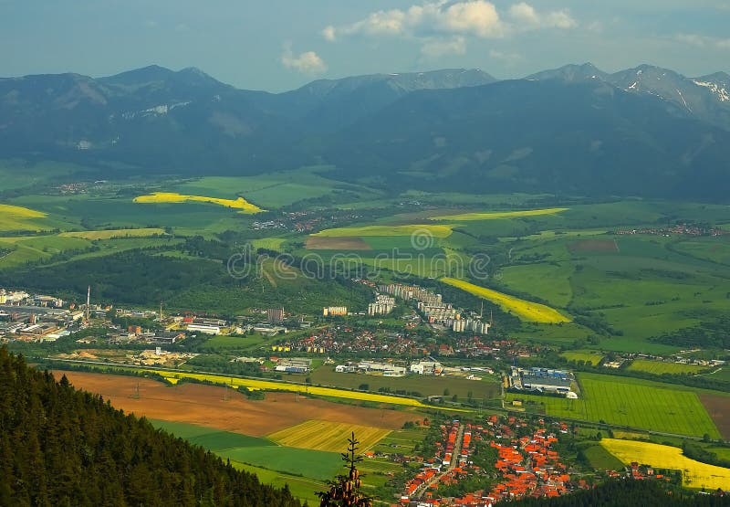 The village Zavazna Poruba and part of the town Liptovsky Mikulas viewed from the top of Poludnica mountain.