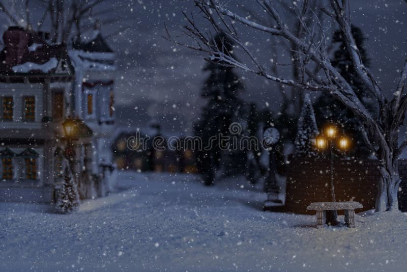 Villaggio di Natale con il banco e la lanterna