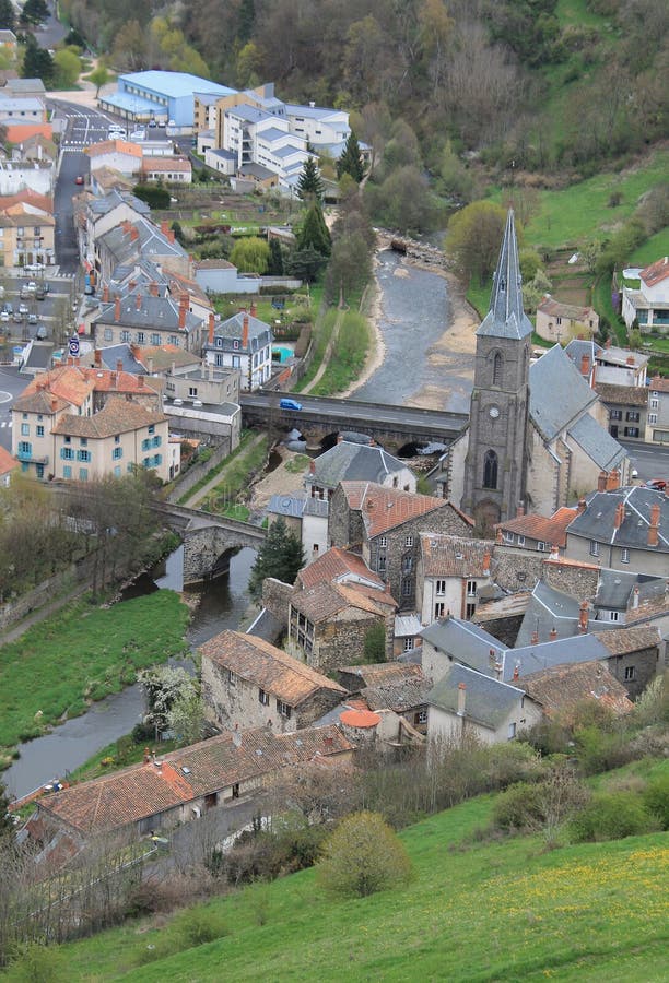 The lower town of Saint-Flour, the St. Christine Church and the two bridges over Ander river, Cantal (France). The lower town of Saint-Flour, the St. Christine Church and the two bridges over Ander river, Cantal (France).