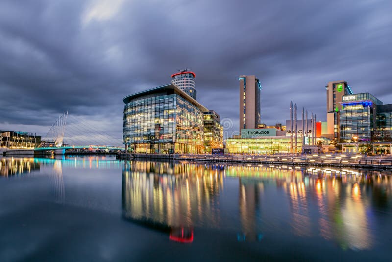 BBC media city at salford quays , Manchester England. Panoramic view of modern buidings at twilight. BBC media city at salford quays , Manchester England. Panoramic view of modern buidings at twilight.