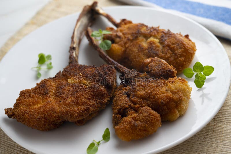 Villeroy Style Roasted Lamb Chops. Breaded and Fried Stock Photo