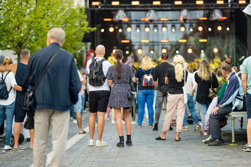 VILNIUS, LITHUANIA - SEPTEMBER 3, 2023: People attending annual Nations Fair, where masters from the national communities of Lithuania present their arts, crafts, national customs and traditions. VILNIUS, LITHUANIA - SEPTEMBER 3, 2023: People attending annual Nations Fair, where masters from the national communities of Lithuania present their arts, crafts, national customs and traditions