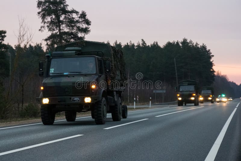 VILNIUS, LITHUANIA - NOVEMBER 11, 2017: Lithuanian Army Convoy drives on highway