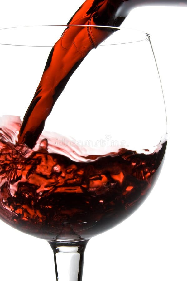 Vino che versa nel vetro immagine stock libera da diritti Vino che versa nel vetro immagine stock libera da diritti