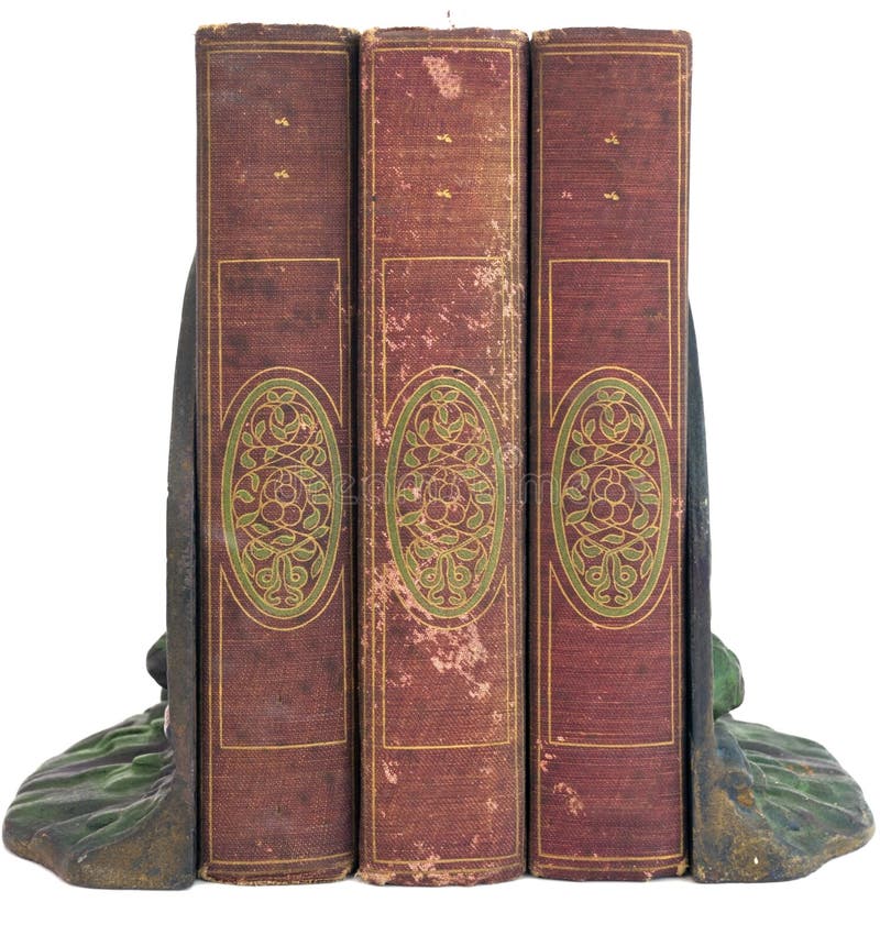 Vintage antique books with iron bookend