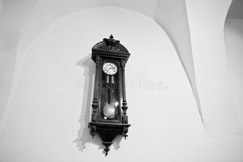 Vintage Antique Wood Clock on Wall. Black and White Stock Image Image