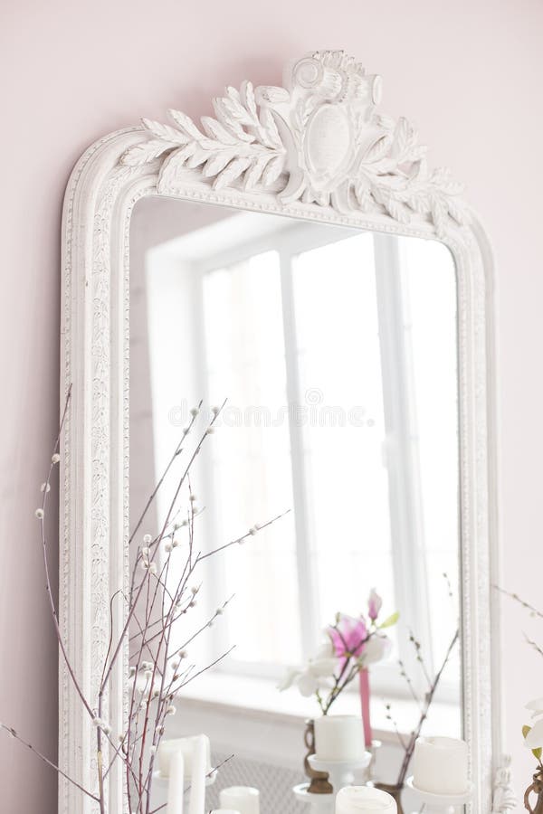 Vintage Baroque mirror with wood carvings in the Royal interior. Close up. Soft focus. stock images Vintage Baroque mirror with wood carvings in the Royal interior. Close up. Soft focus. stock images