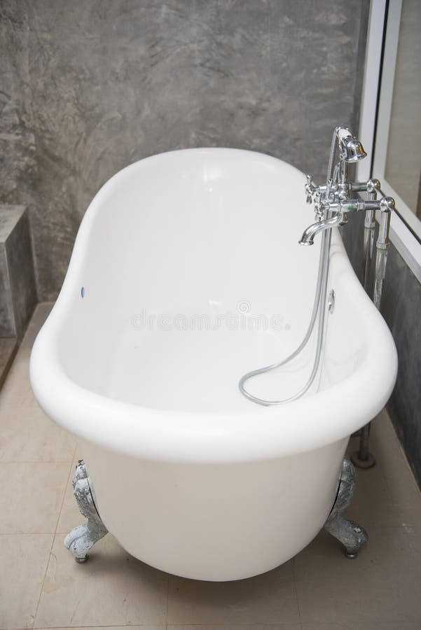 Vintage Bathtub with Faucet and Shower in Bathroom Stock Photo Image