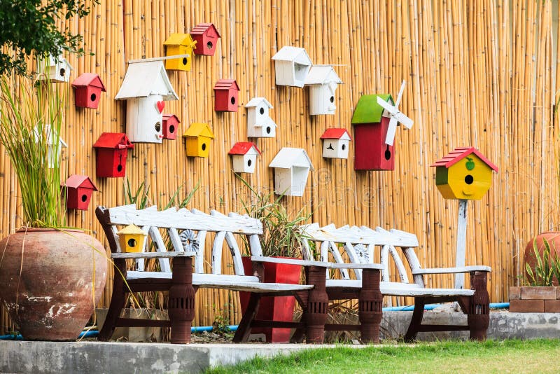 Vintage Bench and Wood wall with Bird s nest