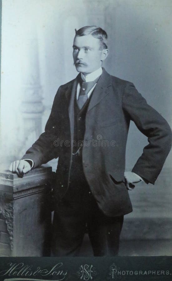 Vintage black and white photo of a young Victorian man with moustache wearing smart suit and big collar shirt 1880s - 1900s. royalty free stock photos Vintage black and white photo of a young Victorian man with moustache wearing smart suit and big collar shirt 1880s - 1900s. royalty free stock photos