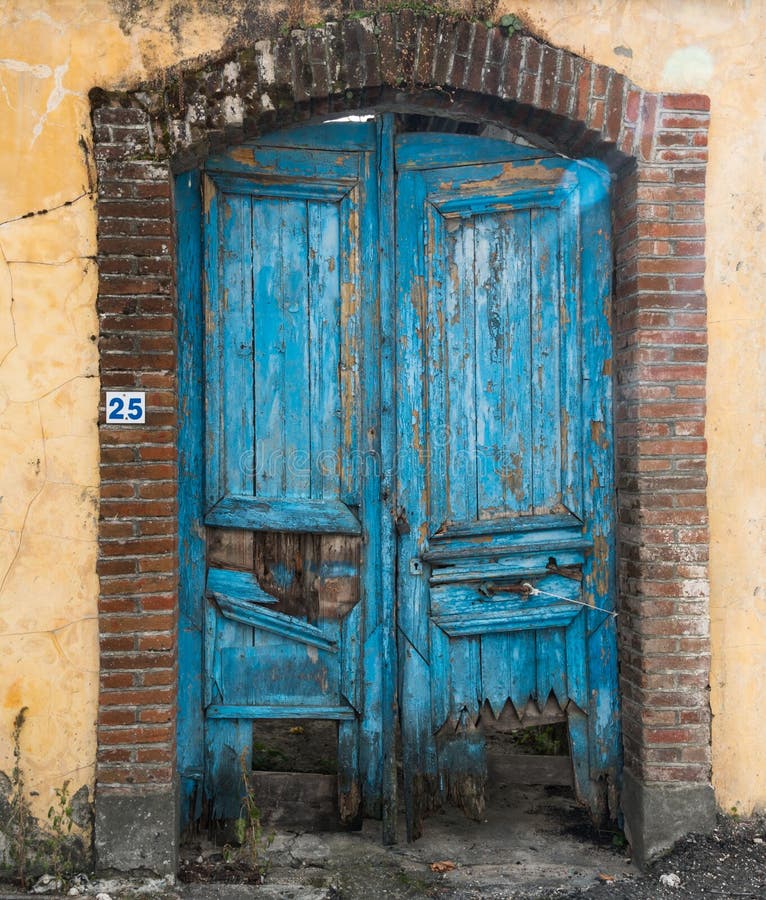 Vintage Blue Closed Damaged Door Stock Photo - Image of vacant, blue ...