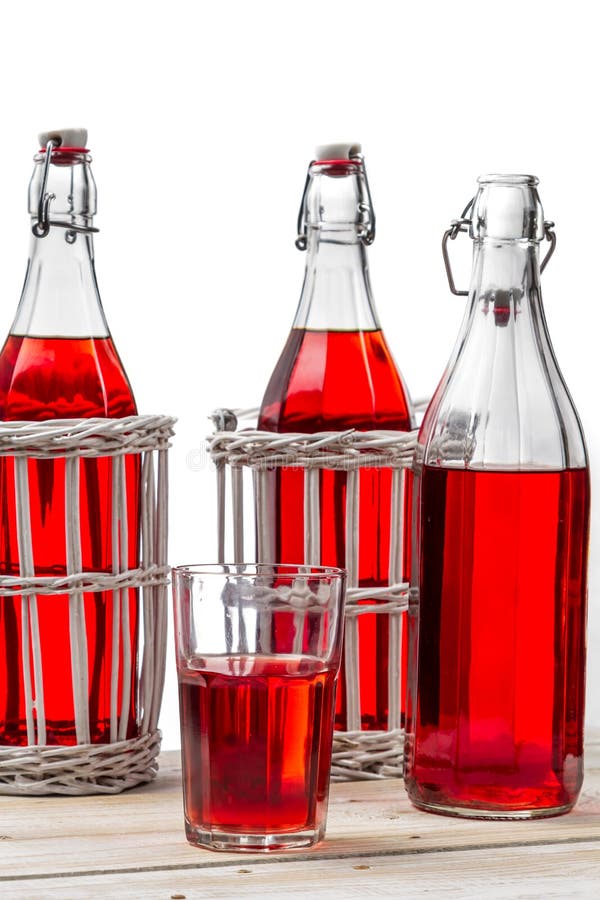 Old bottles with red juice stock image. Image of sparse 29352921