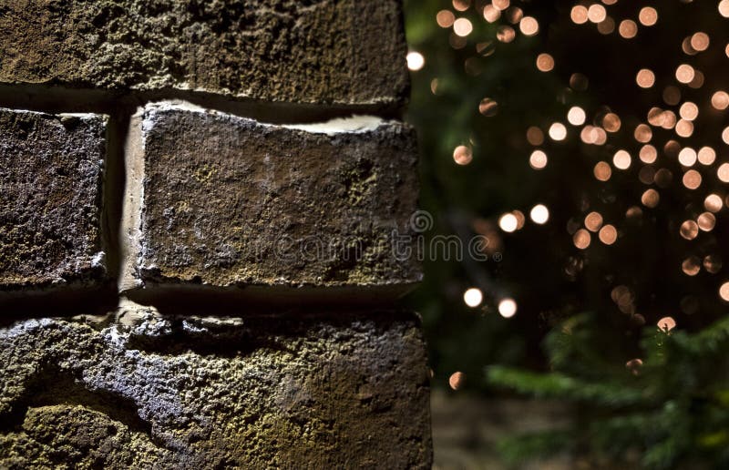 Brick Wall Christmas Background with Lights Glowing Stock Photo Image