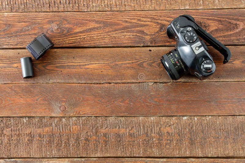 Vintage Camera and Film on Wood Table Stock Image Image of technology