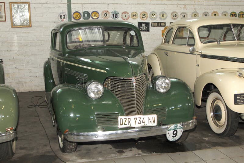 RUSTENBURG, SOUTH AFRICA â€“ FEBRUARY 15: Green 1939 Chevrolet Coupe Front View in Private Collection Philip Classic Cars on February 15, 2014 in Rustenburg South Africa. RUSTENBURG, SOUTH AFRICA â€“ FEBRUARY 15: Green 1939 Chevrolet Coupe Front View in Private Collection Philip Classic Cars on February 15, 2014 in Rustenburg South Africa.