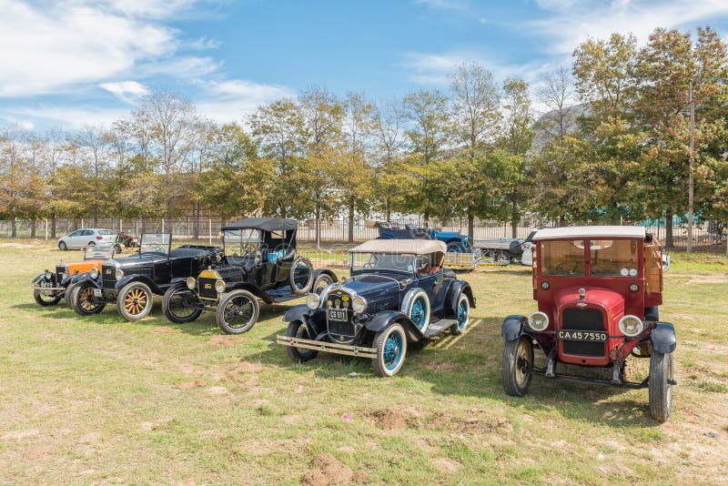 VILLIERSDORP, SOUTH AFRICA - APRIL 12, 2021: Vintage cars on display. Left to right,: Morris Minor, 1926 Model T, 1915 Model T, 1931 Model A roadster, Chevrolet 1927 pickup. VILLIERSDORP, SOUTH AFRICA - APRIL 12, 2021: Vintage cars on display. Left to right,: Morris Minor, 1926 Model T, 1915 Model T, 1931 Model A roadster, Chevrolet 1927 pickup