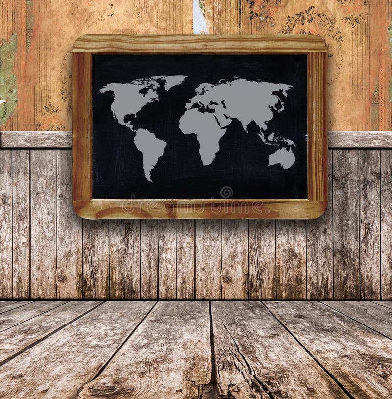 Vintage classroom with blackboard and world map on wall royalty free stock photos.