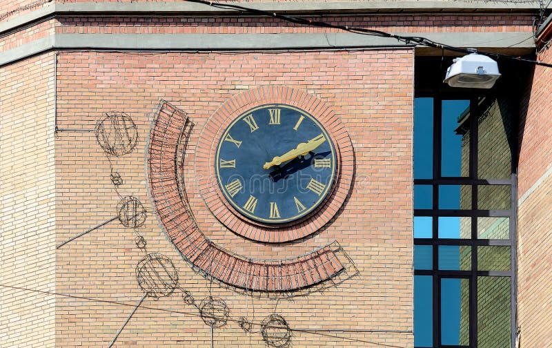 Vintage Clock on the Wall of Building in Kyiv Ukraine Stock Photo