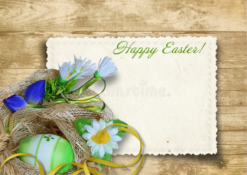 Vintage Easter card with nest of easter egg on a wooden background