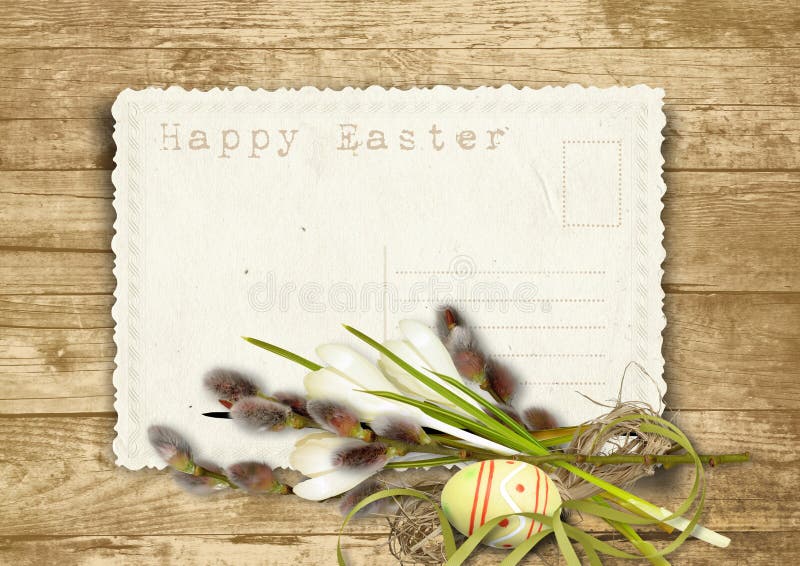 Vintage Easter card with pussy-willow on a wooden background