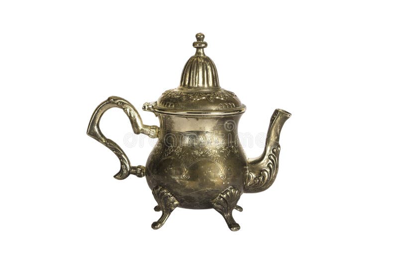 Vintage engraved silver teapot, allowing to brew tea isolated on a white background. Engraved silver Turkish teapot on a white bac. Kground