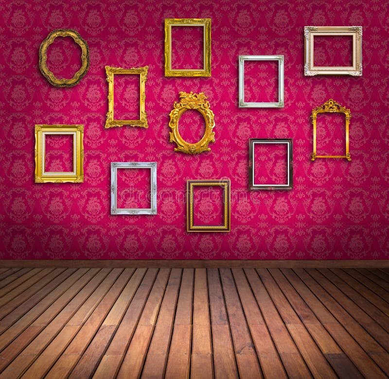 Vintage frame in pink wallpaper room