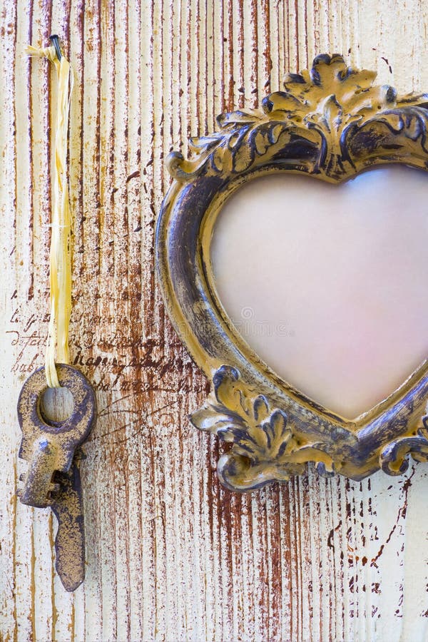 Vintage frame on a wooden background