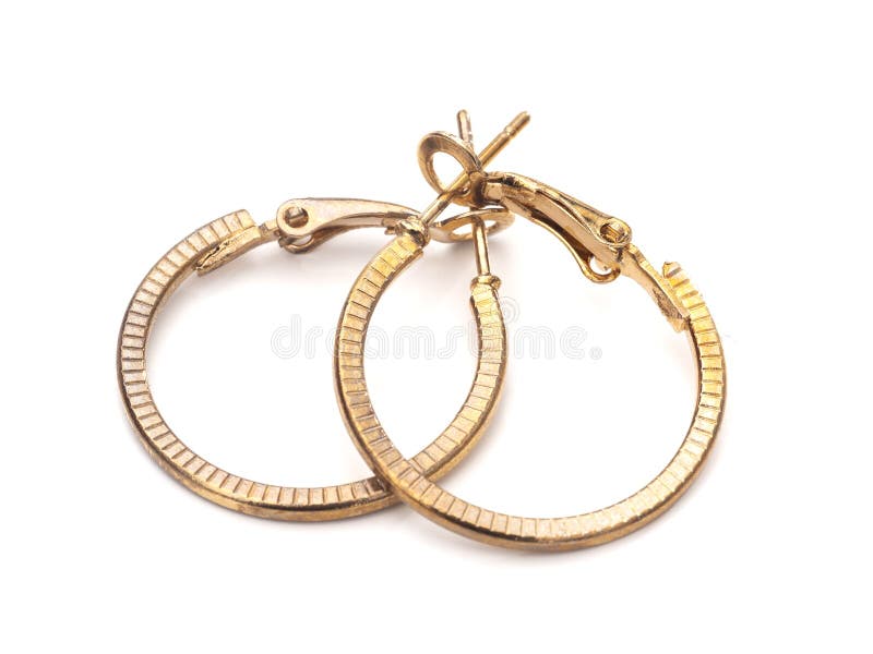 Vintage gold colour hoop earrings, pair, on white background.