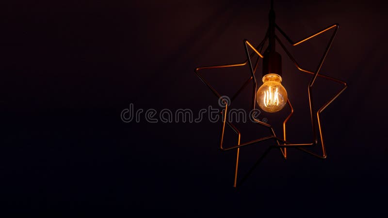 Vintage Incandescent Light Bulb Filament on Black, Close Up Shot Stock ...