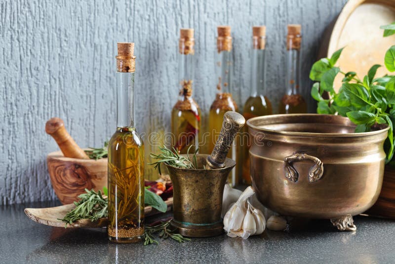 Vintage kitchen utensils with bottles of olive oil. stock photos Vintage kitchen utensils with bottles of olive oil. stock photos