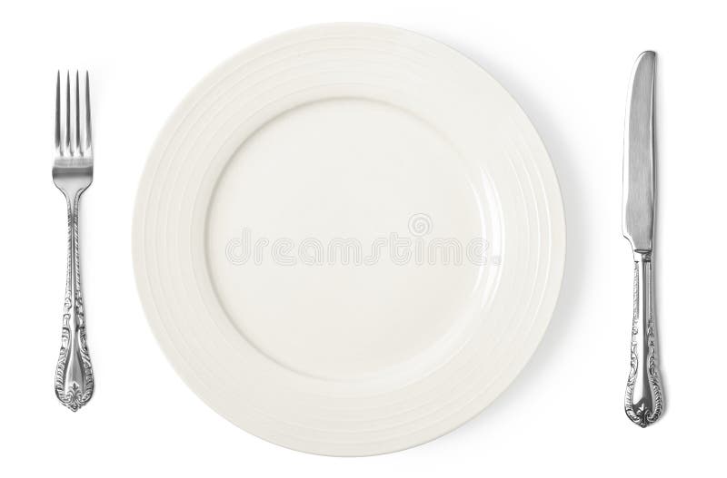Vintage knife, fork and plate on white background royalty free stock photo