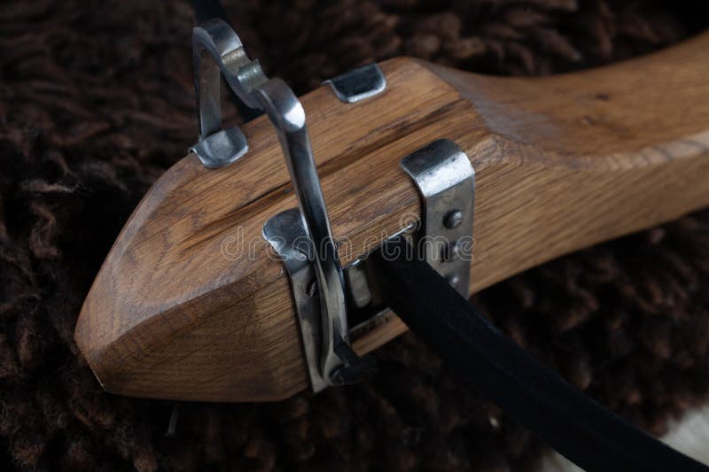 Vintage medieval crossbow on sheep fur background. Sheep gun illustrations