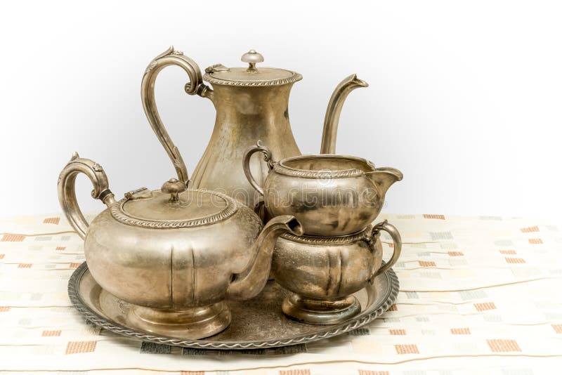Vintage metal tea set stock photo. Image of silver, dishes 65693052