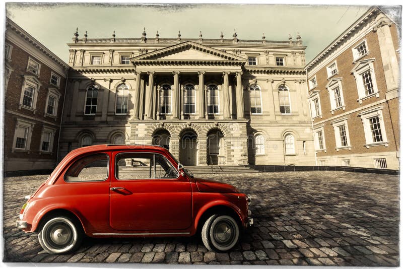 Vintage old classic italian red car. Osgoode Hall, historic building. Toronto, Canada stock images Vintage old classic italian red car. Osgoode Hall, historic building. Toronto, Canada stock images