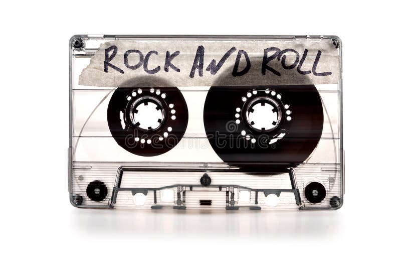 Vintage old film music cassette isolated on white background with the inscription rock and roll, background music, music