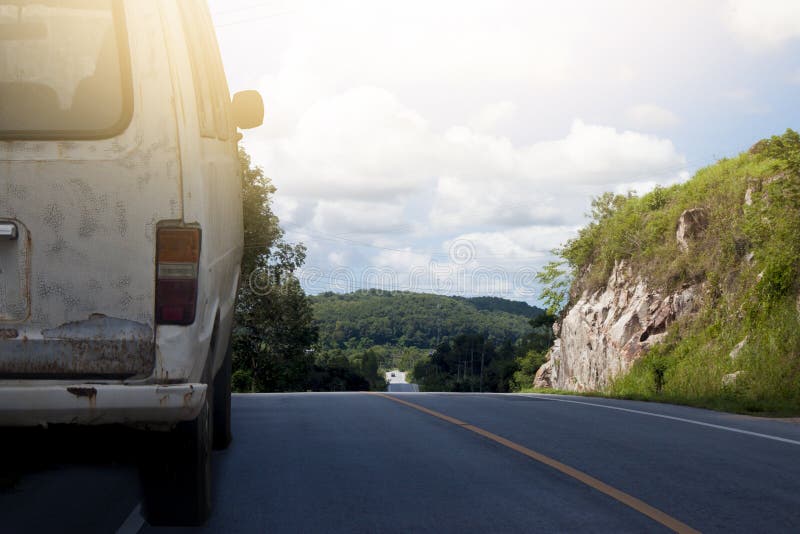 Vintage of old van on the road trip.